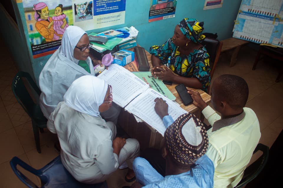 CMS team members working with community